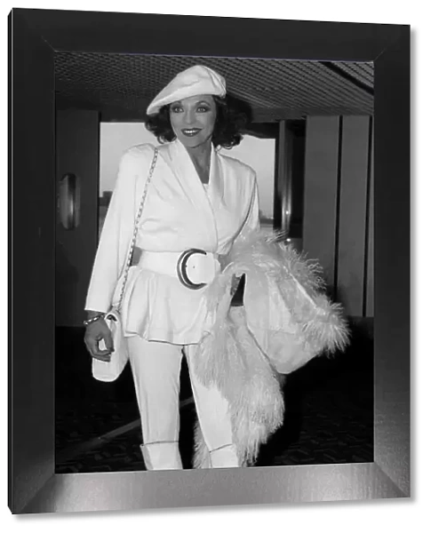 Joan Collins British actress arriving at Heathrow from Los Angeles in January 1988