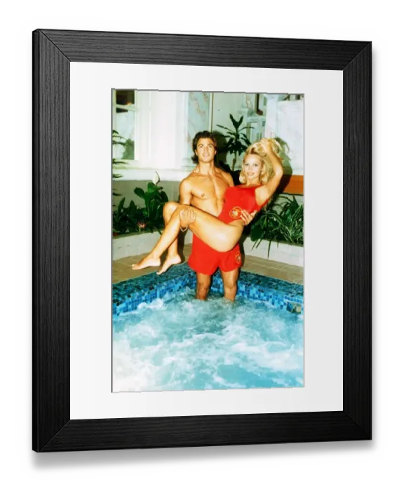 Framed Print : Pamela Anderson American Actress Being lifted by David Charvet her co-star in Baywatch Framed Print : Pamela Anderson American Actress Being lifted by David Charvet her co-star in Baywatch