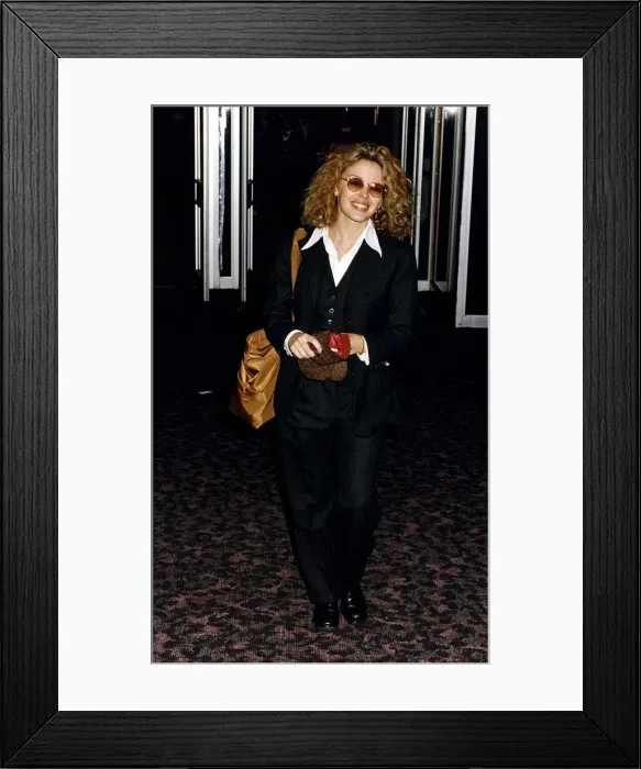 Framed Print : Kylie Minogue Actress Singer Departs From London Heathrow