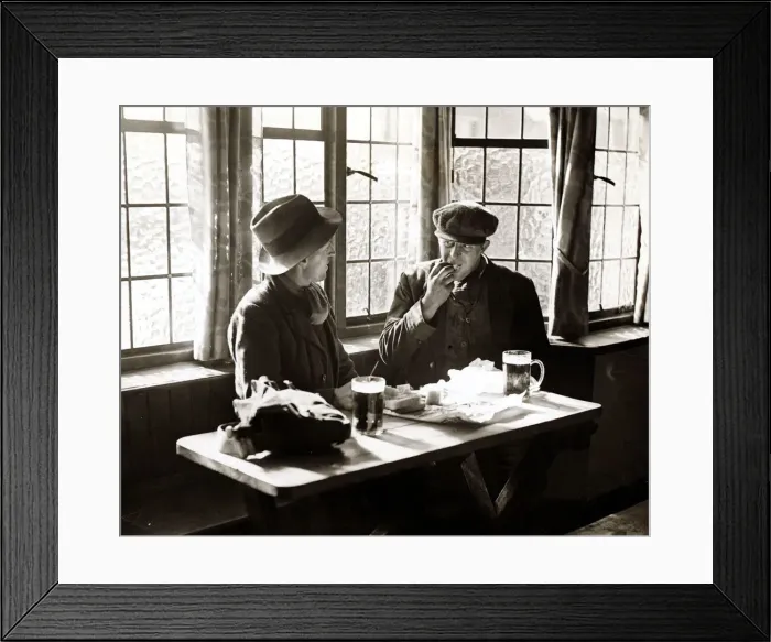 Framed Print : A couple of men having their lunch with a pint of beer in a public house Framed Print : A couple of men having their lunch with a pint of beer in a public house