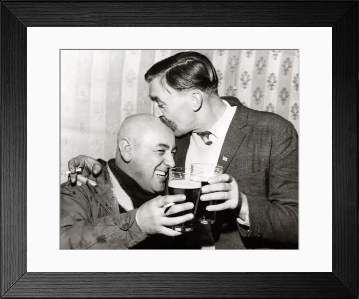 Framed Print : Doug Holberry and Len Phillips - November 1968 celebrate with a couple of pints of Framed Print : Doug Holberry and Len Phillips - November 1968 celebrate with a couple of pints of