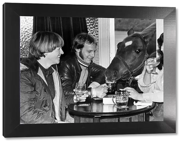 Roman Crumpet the Drinking horse shares a pint with his owners 1977