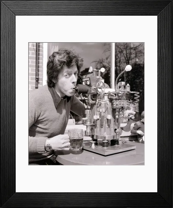 Framed Print : Dave Trotman designer from Southampton with his pint of beer tester it dispenses beer a Framed Print : Dave Trotman designer from Southampton with his pint of beer tester it dispenses beer a