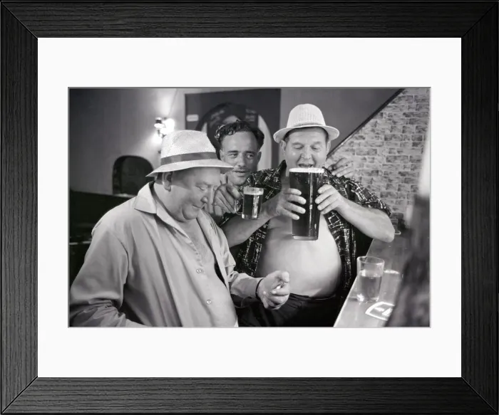 Framed Print : British tourists enjoying a litre of beer whilst on holiday in Spain June 1965 Framed Print : British tourists enjoying a litre of beer whilst on holiday in Spain June 1965