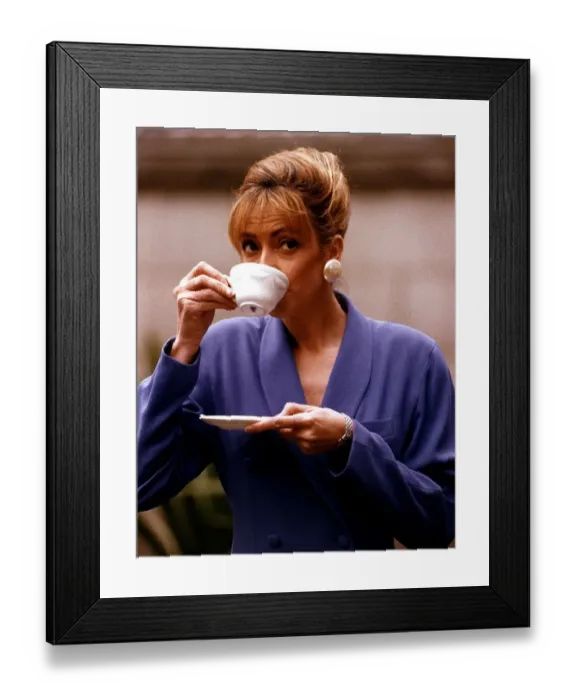Framed Print : Sharon Maughan actress drinking a cup of coffee during recording of an advert for Gold Framed Print : Sharon Maughan actress drinking a cup of coffee during recording of an advert for Gold