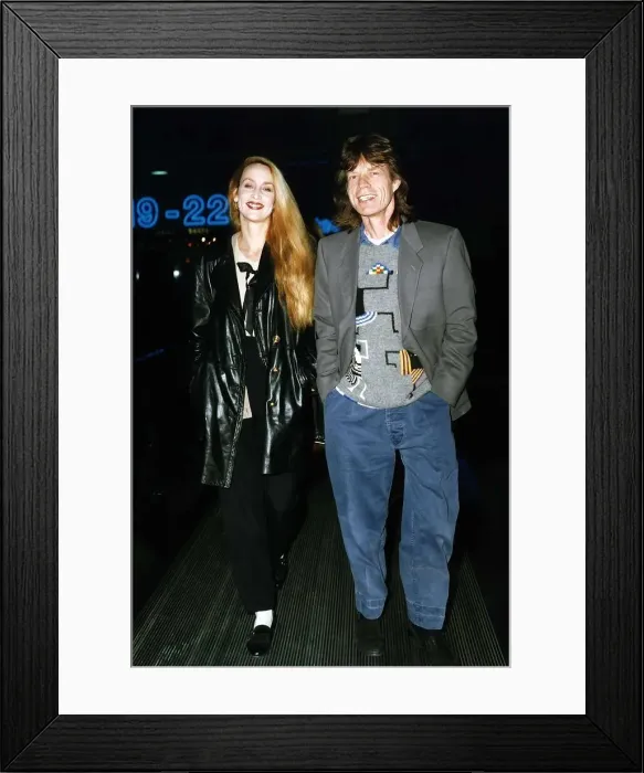 Framed Print : Rolling Stones: Mick Jagger walks with wife actress model Jerry Hall in 1993