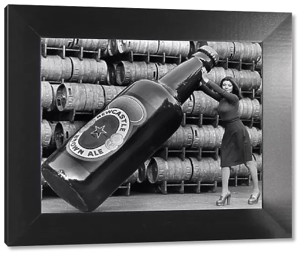 Janette Harper with a Giant Newcastle Brown Ale Bottle 1977