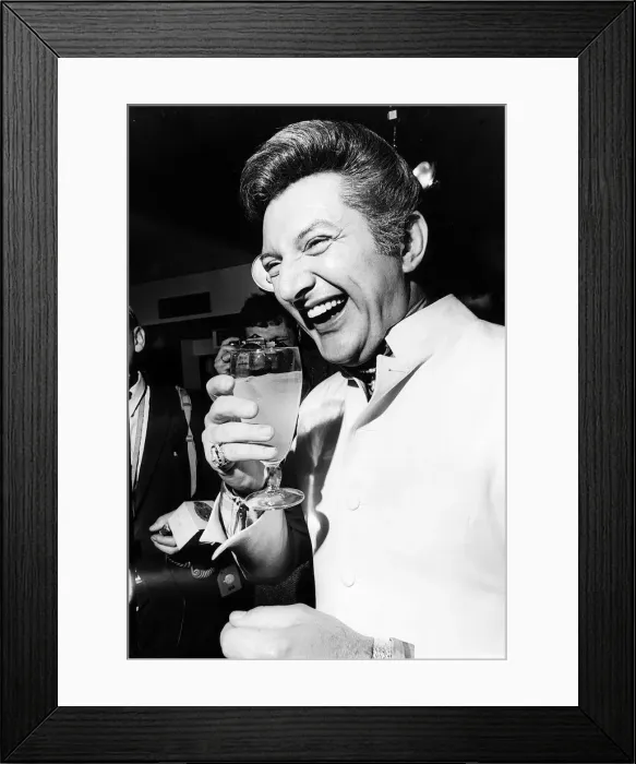 Framed Print : Pianist Liberace drinks a soft drink at a press conference March 1968 Framed Print : Pianist Liberace drinks a soft drink at a press conference March 1968