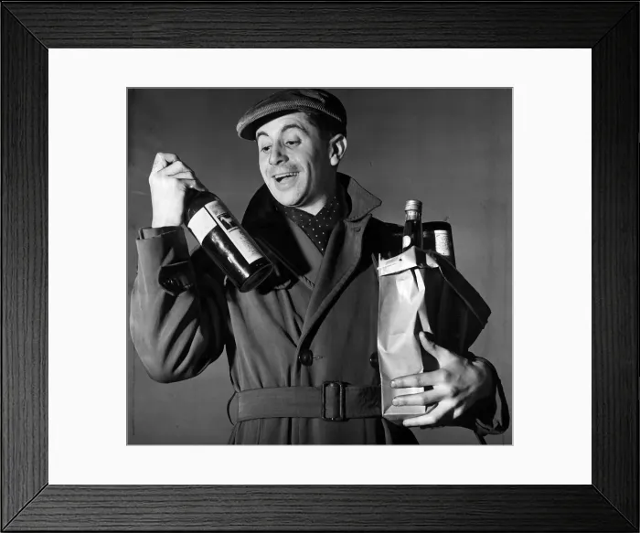 Framed Print : Hogmanay celebrations 1952 Our Scottish gent gets in supplies of Whisky for his new Framed Print : Hogmanay celebrations 1952 Our Scottish gent gets in supplies of Whisky for his new