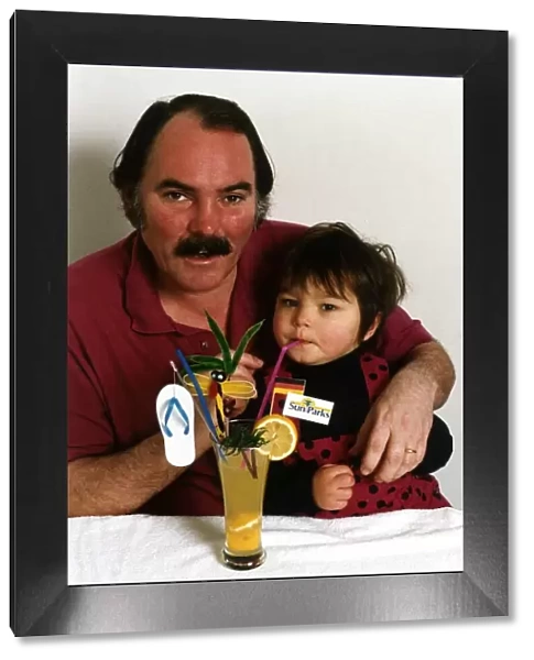 Kevin Lloyd Actor With His Son Drinking A Childrens Cocktail