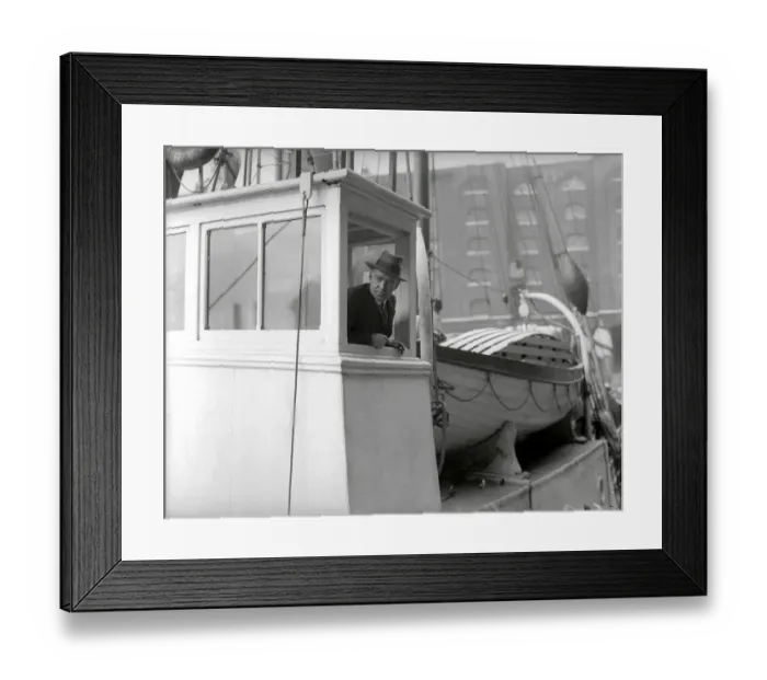 Framed Print : Sir Ernest Shackleton seen here aboard The Quest. in Londons St Cathrines Dock