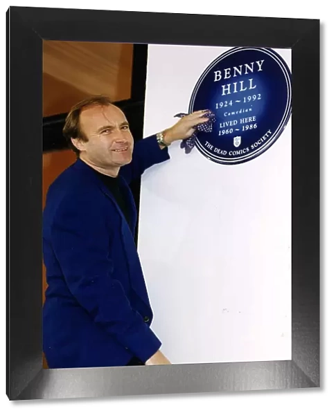 Phil Collins Polishes The Plaque In Rememberence Of The Late Benny Hill Actor Comedian