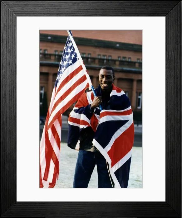 Framed Print : Tony Jarrett athlete runner with American and British flags at Kelvin Hall Glasgow Framed Print : Tony Jarrett athlete runner with American and British flags at Kelvin Hall Glasgow