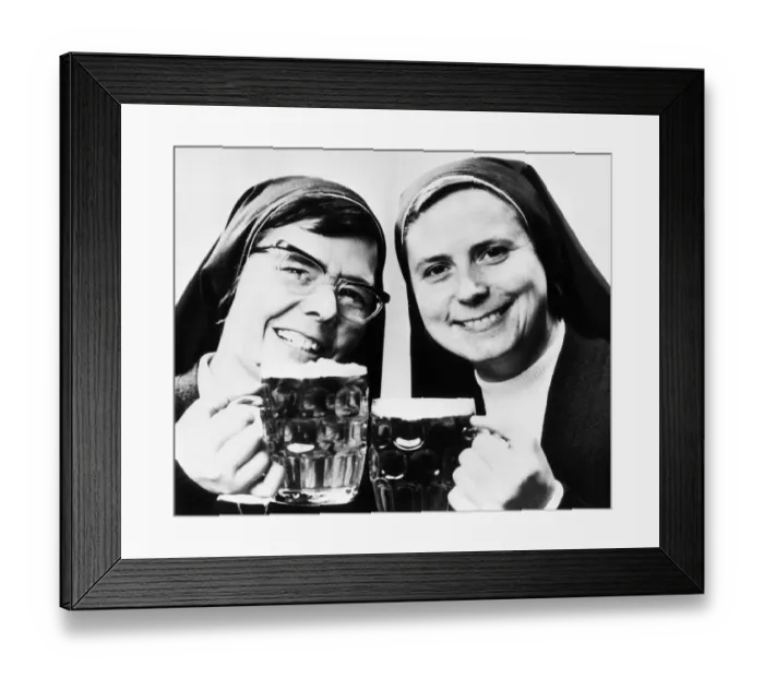 Framed Print : Nuns Sisters Elizabeth and Joan with pints of beer 1976 Framed Print : Nuns Sisters Elizabeth and Joan with pints of beer 1976