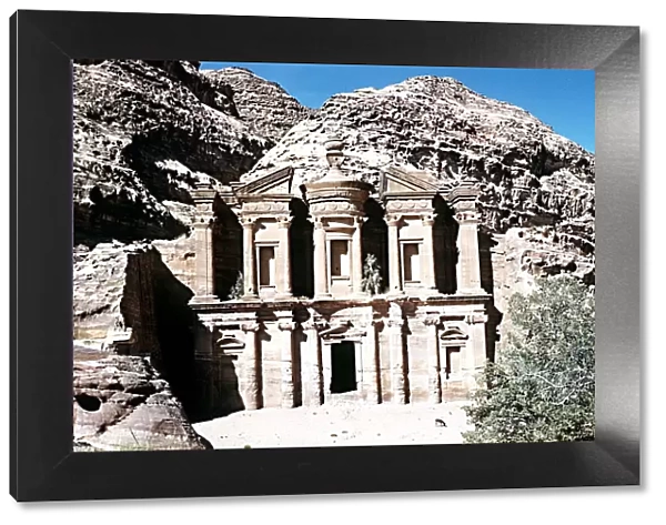 Facade of the Deir or Monastery temple in the ruins of Petra Southern Jordan Palestine