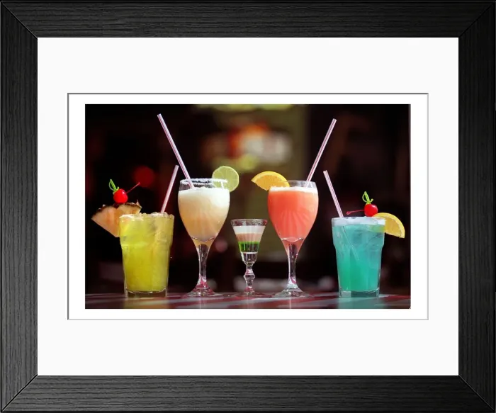 Framed Print : Selection of cocktails lined up on the bar September 1998
