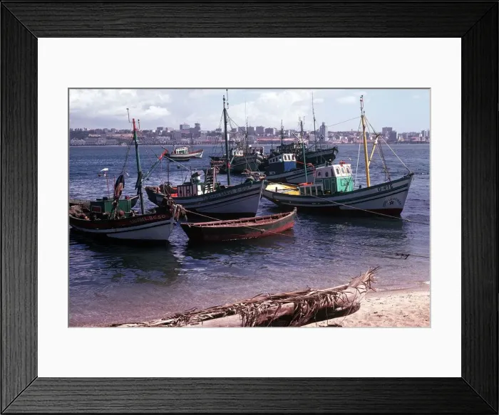 Framed Print : A small fishing community on the edge of the bay at the port of luanda the capital Framed Print : A small fishing community on the edge of the bay at the port of luanda the capital