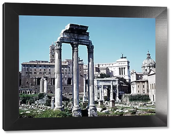 Ruins of the Temple of Castor and Pollux looking towards Arch of Septimius Severus Italy