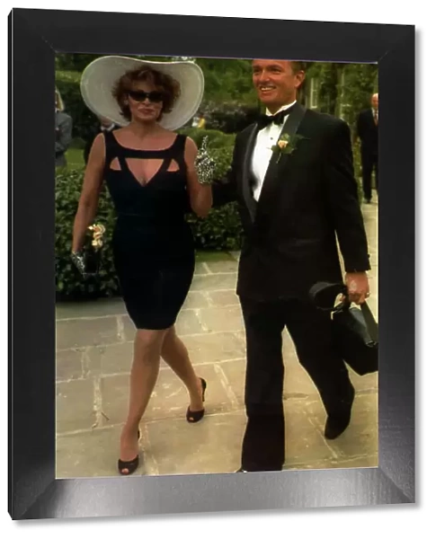Raquel Welch Actress with boyfriend Bob Moore arriving for her sons wedding