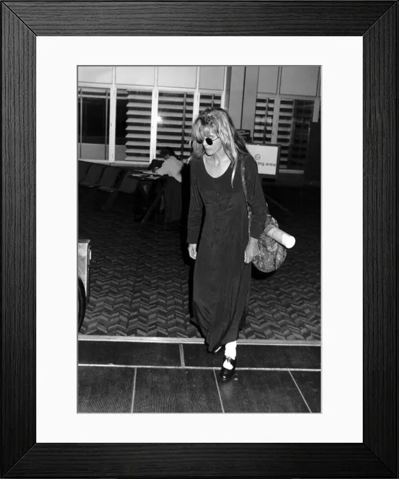Framed Print : Meg Ryan Actress leaving Heathrow Airport for Los Angeles