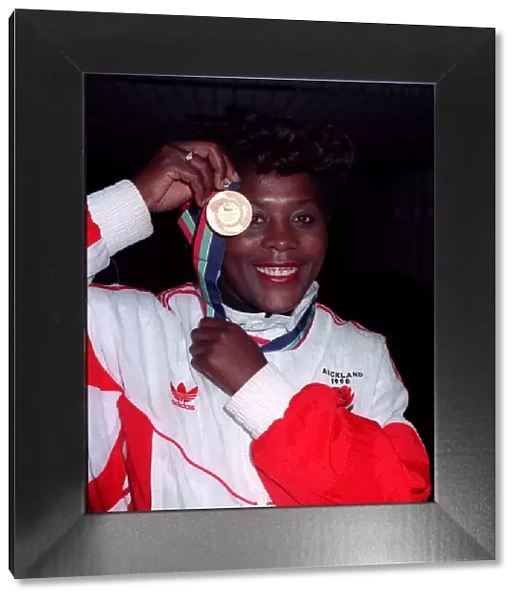 Tessa Sanderson athlete with Olympic Gold medal 2  /  90 at Heathrow airport after