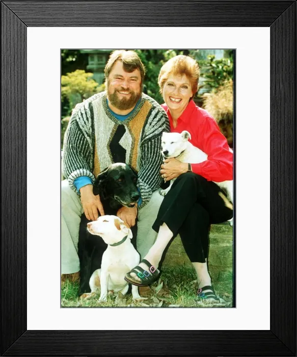 Framed Print : Brian Blessed actor with his wife and dogs Framed Print : Brian Blessed actor with his wife and dogs