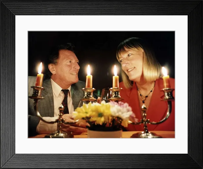 Framed Print : Johnny Briggs Actor with Hilary Bonner Daily Mirror Journalist dining by candlelight Framed Print : Johnny Briggs Actor with Hilary Bonner Daily Mirror Journalist dining by candlelight