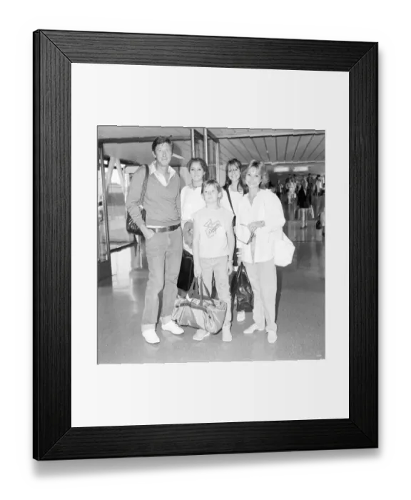 Framed Print : Actress Felicity Kendal with her family at Heathrow July 1984 her husband Framed Print : Actress Felicity Kendal with her family at Heathrow July 1984 her husband