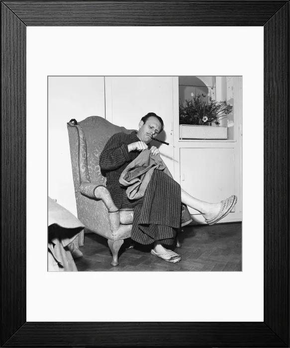 Framed Print : Actor Terry Thomas sitting at home sewing his coat February 1957 Framed Print : Actor Terry Thomas sitting at home sewing his coat February 1957