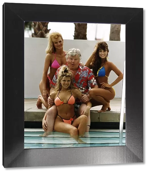 Benny Hill Actor Comedian With His Hills Angels In Their Bikinins At The Side Of A