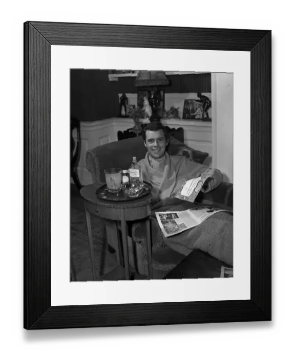 Framed Print : Dirk Bogarde actor convalescing in his home at Ammersham Common after an attack of Framed Print : Dirk Bogarde actor convalescing in his home at Ammersham Common after an attack of