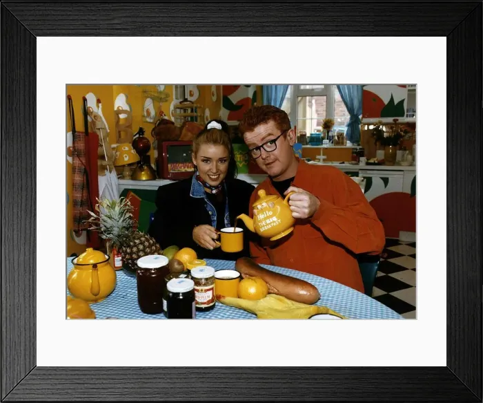 Framed Print : Dannii i Minogue actress presenter and singer sits at breakfast Framed Print : Dannii i Minogue actress presenter and singer sits at breakfast
