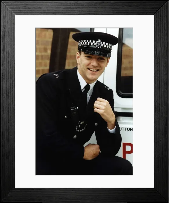 Framed Print : Jonathon Dow Actor as character PC Stringer in ITV TV Programme The Bill
