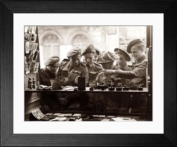 Framed Print : Army Soldiers looking through a shop window - June 1944 for souvenirs to send back Framed Print : Army Soldiers looking through a shop window - June 1944 for souvenirs to send back