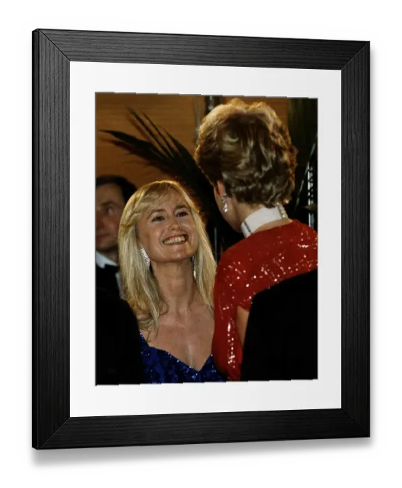 Framed Print : Diana, Princess of Wales talks to actress Susan George as she attends the premiere of Framed Print : Diana, Princess of Wales talks to actress Susan George as she attends the premiere of