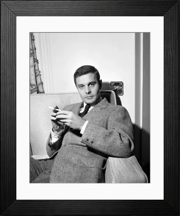 Framed Print : french actor Louis Jourdan pictured at Claridges Hotel in London - he is in the country