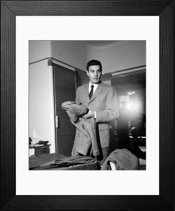 Framed Print : French actor Louis Jourdan pictured at Claridges Hotel in London - he is in the country