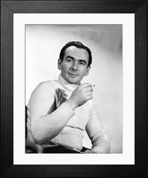 Framed Print : Actor Robert Cousins smoking a cigarette December 1955