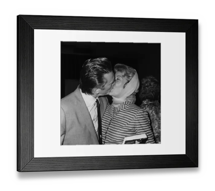Framed Print : Actor Kirk Douglas at London Airport with his wife 1958