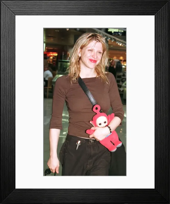 Framed Print : American actress / singer Courtney Love October 1998 leaves Heathrow Airport after Framed Print : American actress / singer Courtney Love October 1998 leaves Heathrow Airport after