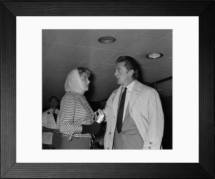 Framed Print : Actor Kirk Douglas at London Airport with his wife August 1958 Framed Print : Actor Kirk Douglas at London Airport with his wife August 1958