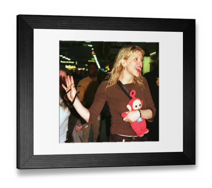 Framed Print : American actress  /  singer Courtney Love October 1998 leaves Heathrow Airport after