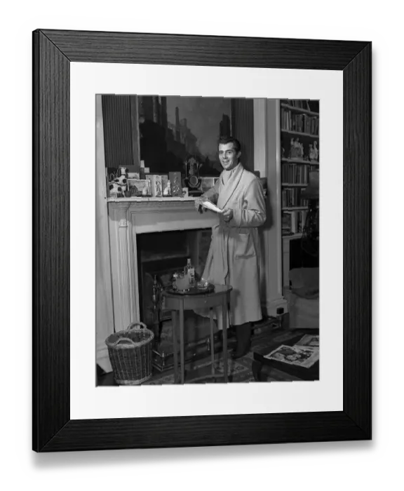 Framed Print : Dirk Bogarde actor convalescing in his home at Ammersham Common after an attack of Framed Print : Dirk Bogarde actor convalescing in his home at Ammersham Common after an attack of