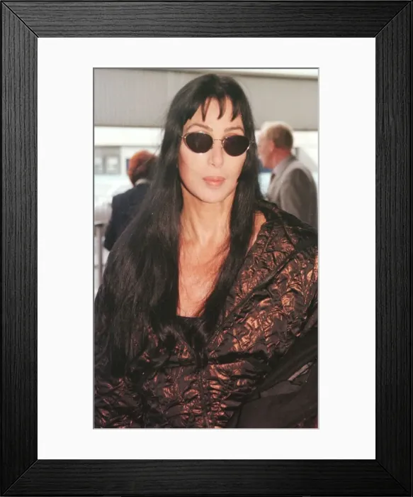 Framed Print : Actress  /  singer Cher leaves Heathrow Airport for Los Angeles after her recent