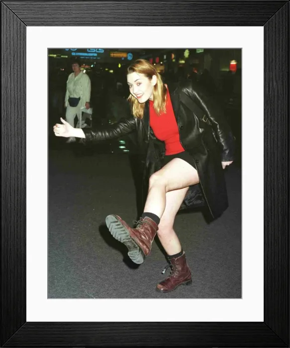 Framed Print : Titanic actress Kate Winslet leaving Heathrow Feb 1998 for New York on Concorde wearing Framed Print : Titanic actress Kate Winslet leaving Heathrow Feb 1998 for New York on Concorde wearing