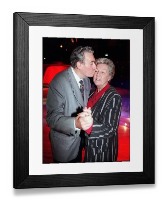 Framed Print : Bryan Mosley actor December 1998 dancing with wife Norma at a Christmas Party Framed Print : Bryan Mosley actor December 1998 dancing with wife Norma at a Christmas Party