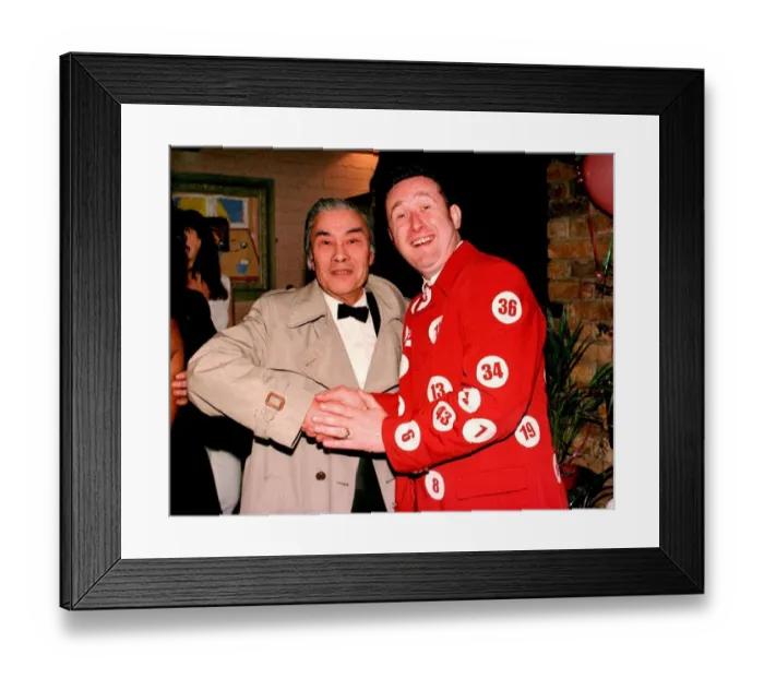 Framed Print : Lenny Lottery meets Bert Kwouk Actor Cator from the Pink Panther films at Londons