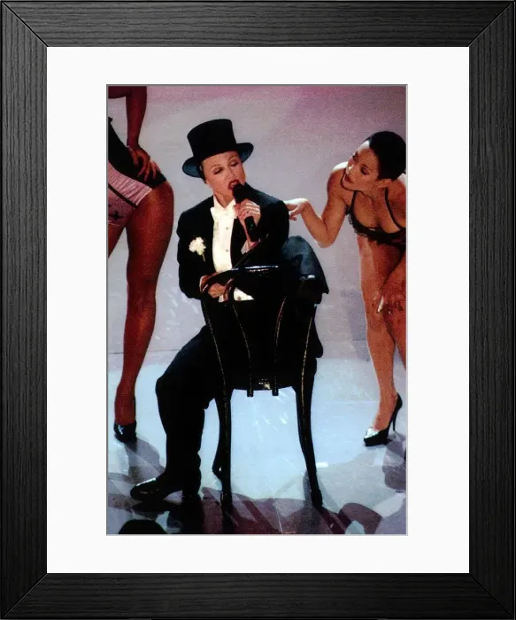Framed Print : Madonna the singer and actress in a tux and top hat as the opening number of the MTV Framed Print : Madonna the singer and actress in a tux and top hat as the opening number of the MTV