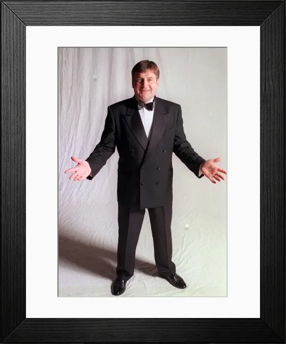 Framed Print : Actor Vince Earl in tuxedo in studio