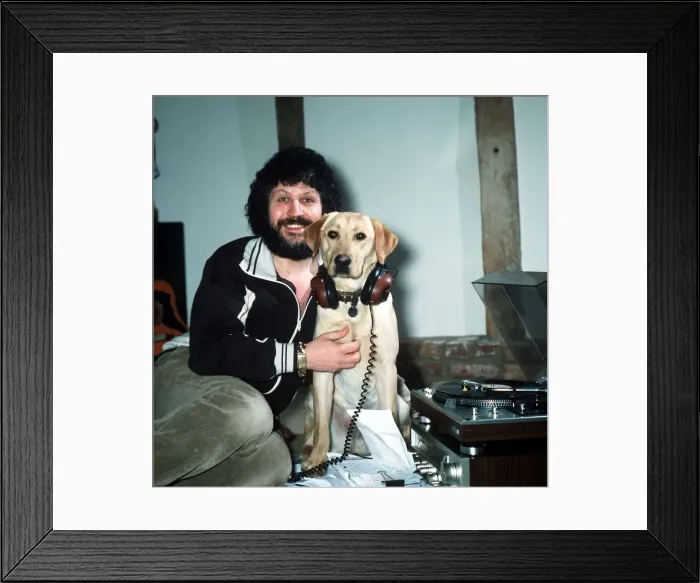 Framed Print : DJ Dave Lee Travis at home with his dog March 1981 Framed Print : DJ Dave Lee Travis at home with his dog March 1981